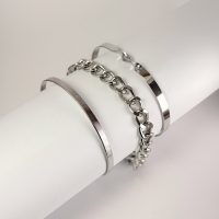 ست دستبند و بنگل طرح کارتیه با آبکاری نقره‌ای